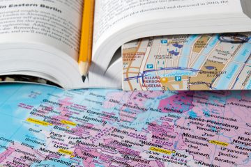 Travel map with book.